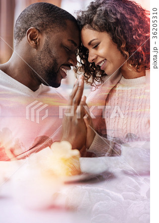 Happy couple keeping hands together Happy couple keeping hands together 36205310