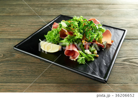 Delicious food on the wooden table Delicious food on the wooden table 36206652