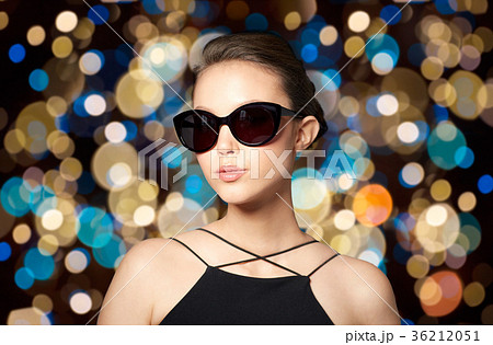beautiful young woman in elegant black sunglasses beautiful young woman in elegant black sunglasses 36212051