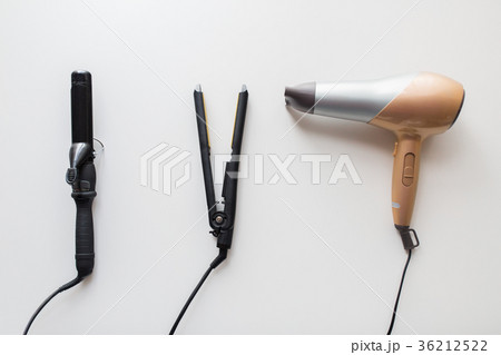 hairdryer, hot styler and curling iron or tongs hairdryer, hot styler and curling iron or tongs 36212522