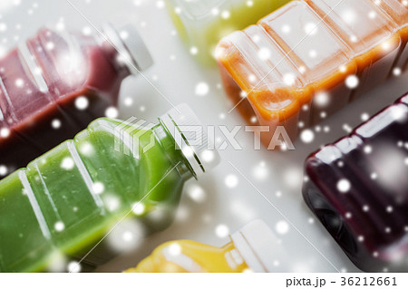 bottles with different fruit or vegetable juices 36212661