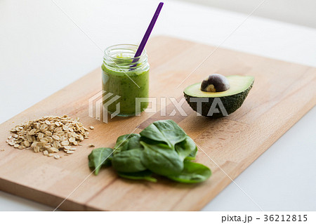 jar with puree or baby food on wooden board jar with puree or baby food on wooden board 36212815