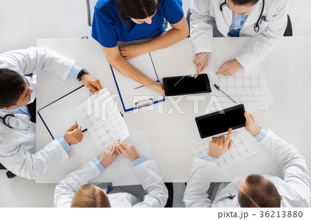 doctors with cardiograms and tablet pc at hospital doctors with cardiograms and tablet pc at hospital 36213880