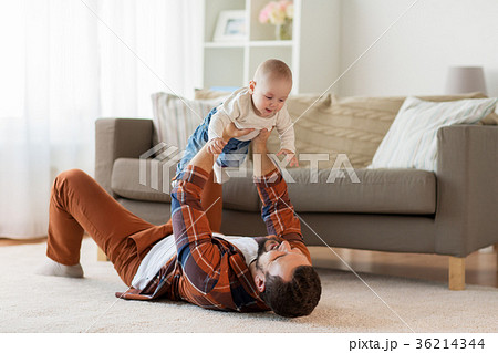 happy father with little baby boy at home 36214344