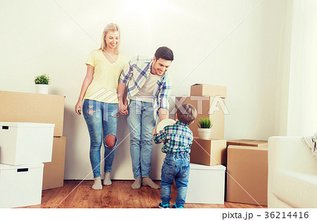 happy family moving to new home and playing ball happy family moving to new home and playing ball 36214416