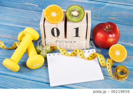 Cube calendar, fruits, dumbbells and tape measure 36219656