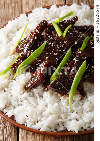 spicy Mongolian beef with rice close-up. vertical 36226574