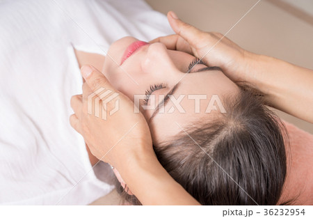 Woman is getting face massage in a face spa course Woman is getting face massage in a face spa course 36232954