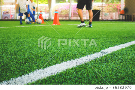 Soccer training field white line with kid training Soccer training field white line with kid training 36232970