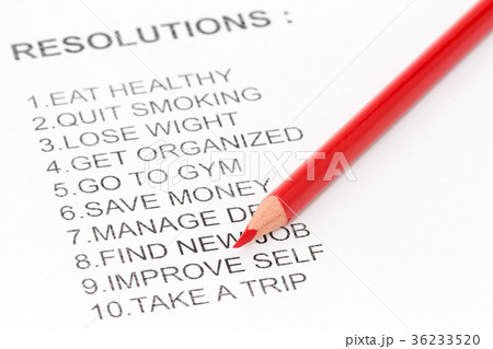 Red pencil and list of resolutions 36233520