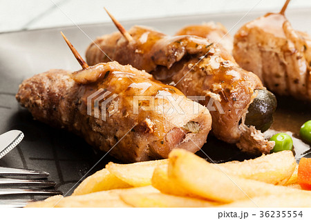 Beef rolls and vegetables 36235554