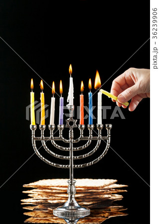 Menorah with candles for Hanukkah on black table Menorah with candles for Hanukkah on black table 36239906