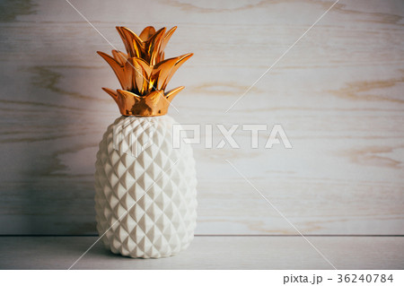 Decorative ceramic pineapple on white background Decorative ceramic pineapple on white background 36240784