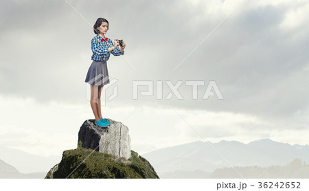 Girl with photo camera Girl with photo camera 36242652
