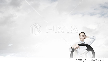 Woman with steering wheel 36242780