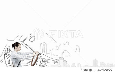 Woman with steering wheel Woman with steering wheel 36242855