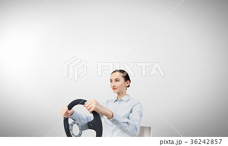 Woman with steering wheel 36242857