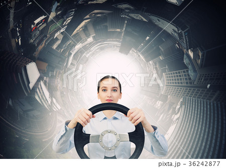 Woman with steering wheel 36242877