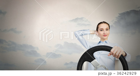 Woman with steering wheel 36242929