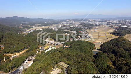 空撮 福岡県飯塚市八木山峠上空より 飯塚市内を撮影の写真素材