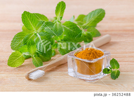 alternative natural toothpaste turmeric powder 36252488