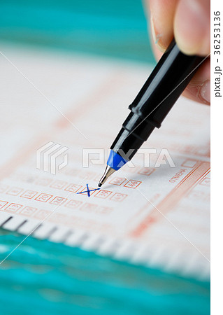 Photo of human's hand with lottery ticket 36253136