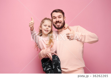 Young father with his baby daughter with thumb up 36262265