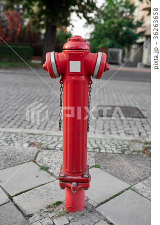 Red fire hydrant on a city street Red fire hydrant on a city street 36263658