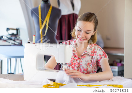 Seamstress at work 36271331