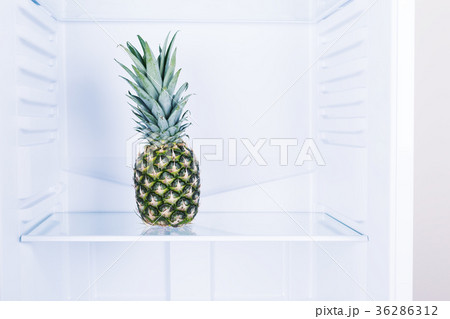Pinepple fruit in clean refrigerato inside 36286312