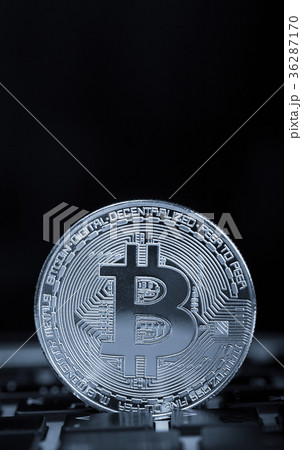 Bitcoin on laptop keyboard 36287170