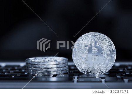 Bitcoin on laptop keyboard 36287171