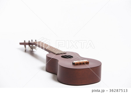 Ukulele on a white background Ukulele on a white background 36287513