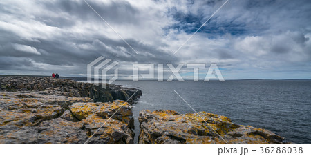 People on the cliffs in Doolins Bay 36288038