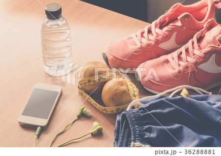 fitness concept with Exercise Equipment on wooden fitness concept with Exercise Equipment on wooden 36288881