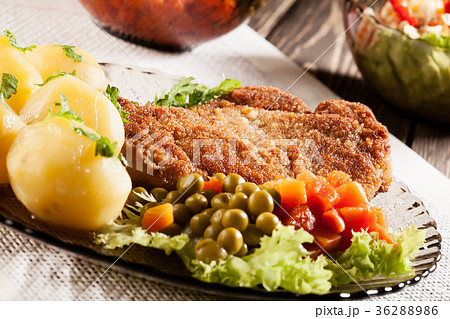 Breaded chop and potatoes Breaded chop and potatoes 36288986