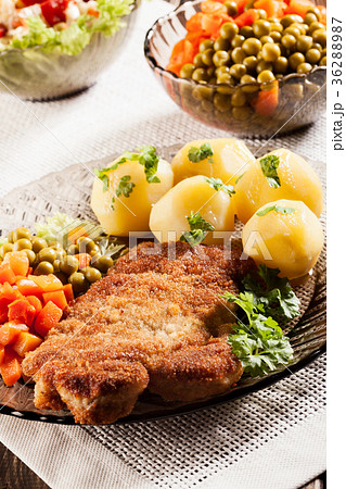 Breaded chop and potatoes Breaded chop and potatoes 36288987