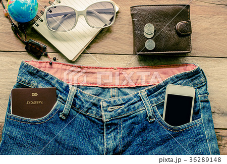 Accessories and apparel for men on a wooden floor Accessories and apparel for men on a wooden floor 36289148