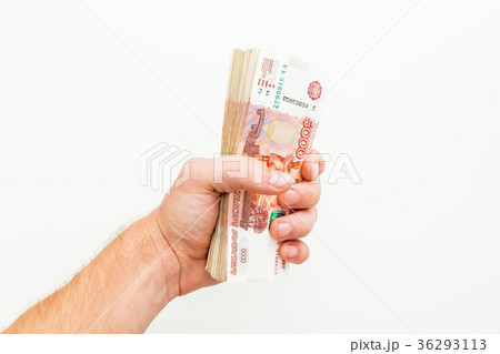 Russian banknotes 5000 rubles in men hand on white 36293113