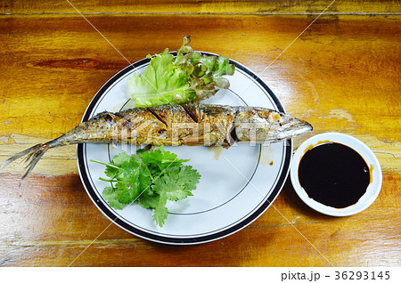 fried pacific mackerel and vegetable with sauce 36293145