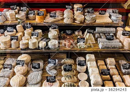 Сheeses on the counter of a small store. Paris Сheeses on the counter of a small store. Paris 36294243