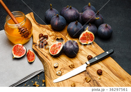 Fig isolated on dark concrete background Fig isolated on dark concrete background 36297561