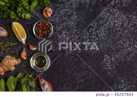 Background with spices, herbs and olive oil. Background with spices, herbs and olive oil. 36297603