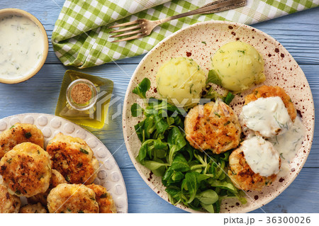 Chicken cutlets served with mashed potatoes. 36300026