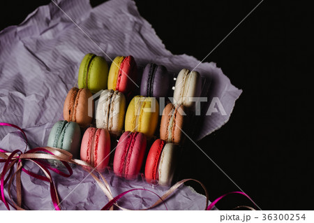 Colorful macaroons set on black background. Food Colorful macaroons set on black background. Food 36300254