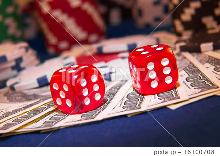 Stack of Poker chips with dice rolls Stack of Poker chips with dice rolls 36300708