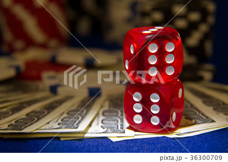 Stack of Poker chips with dice rolls Stack of Poker chips with dice rolls 36300709