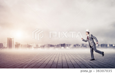 King businessman in elegant suit running and business center at 36307035