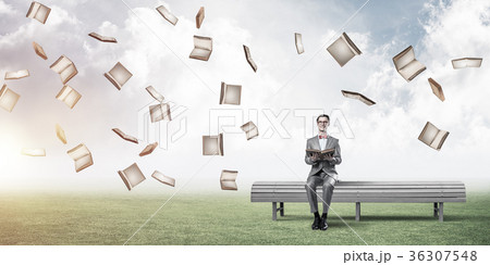 Young businessman or student studying the science and books fly Young businessman or student studying the science and books fly 36307548