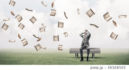 Young man in suit in park dont want to hear anything 36308505